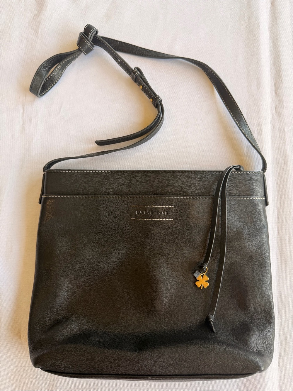 Lucky Brand Black Leather Bag with White Stitching and Clover Charm